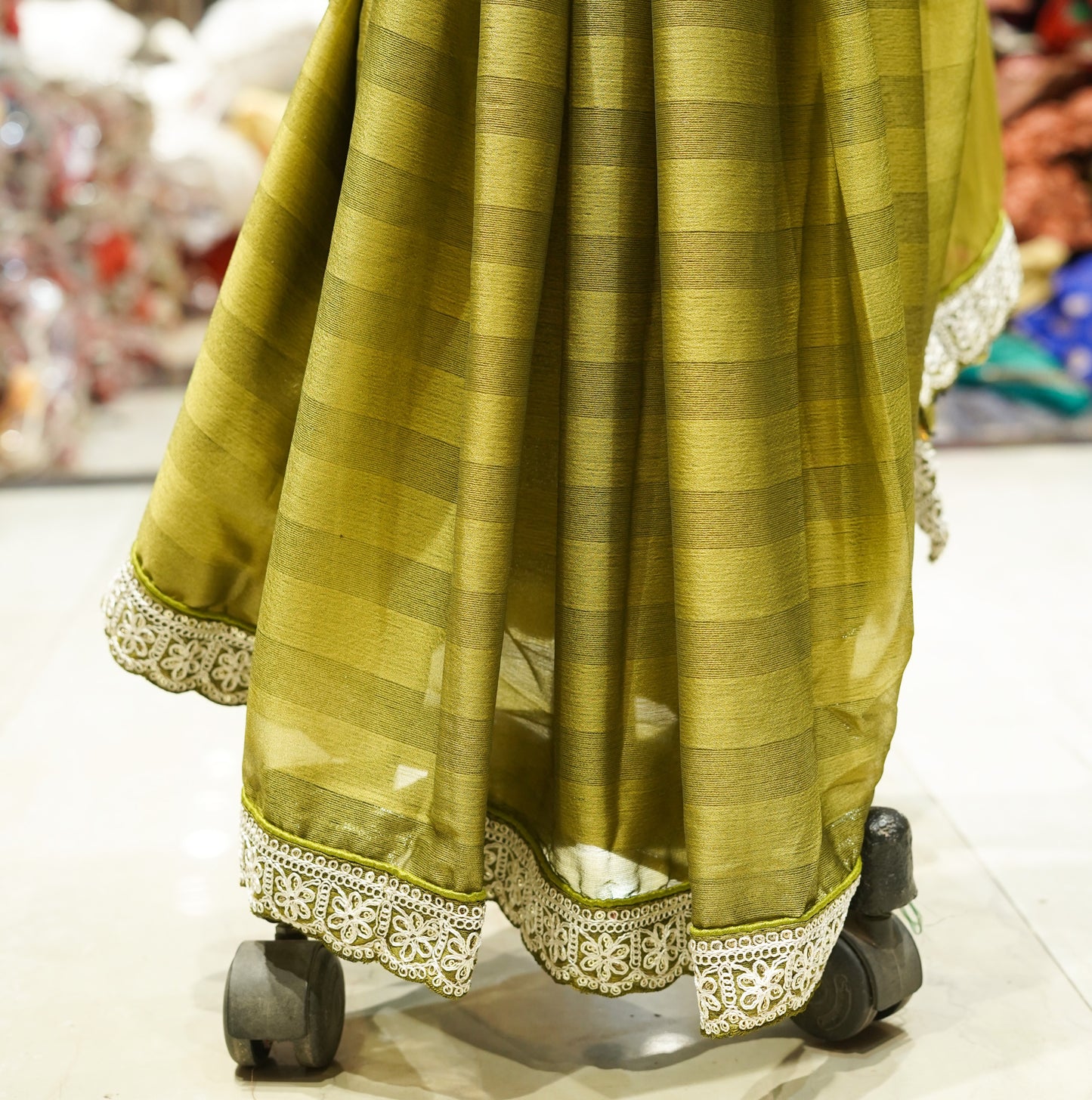 Green georgette saree with stitched blouse