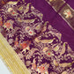 Wine purple dola silk saree with elephant motifs and heavy gota patti border