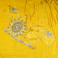 Yellow crepe saree with olive embroidery work and stitched blouse