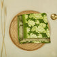 Green crepe saree with floral Print and swaroski border