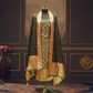 Traditional garment on a mannequin against a decorative wall.