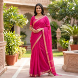 Pink  cotton linen saree with gold zari border